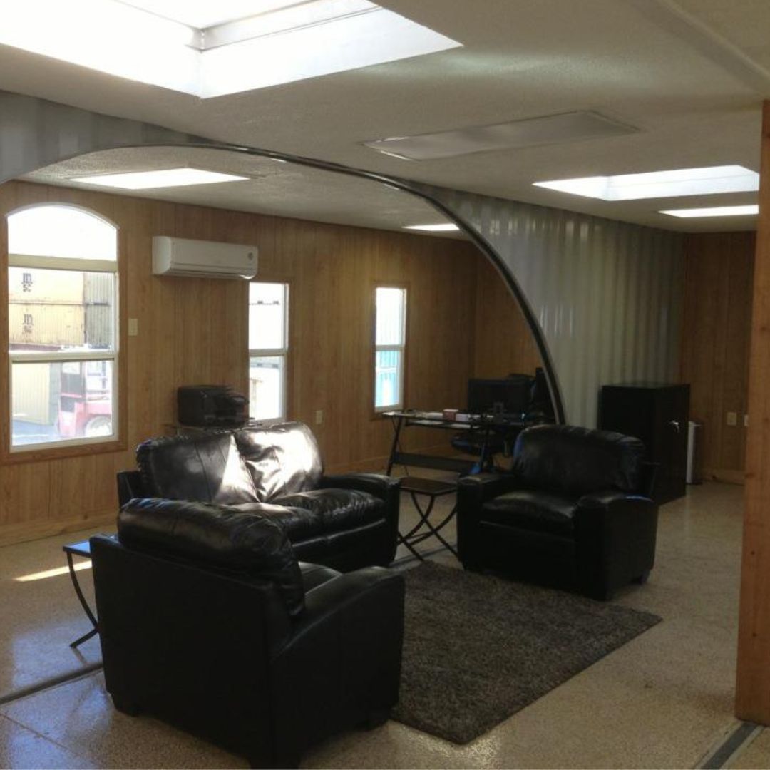 a shipping container with a rounded wall partition