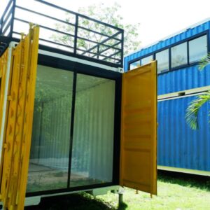 Modified shipping container with a glass wall
