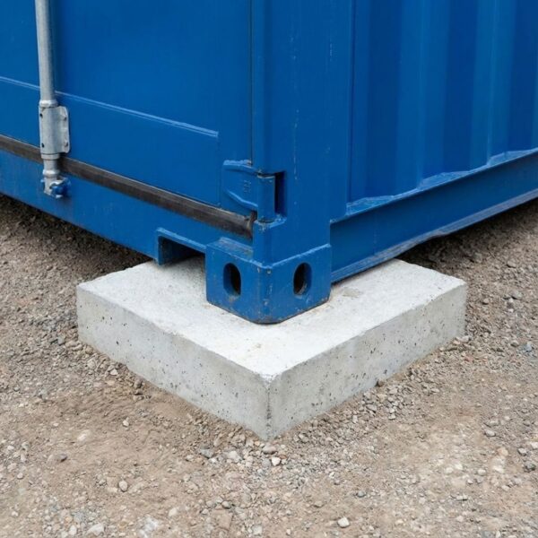 a container corner on a level concrete foundation